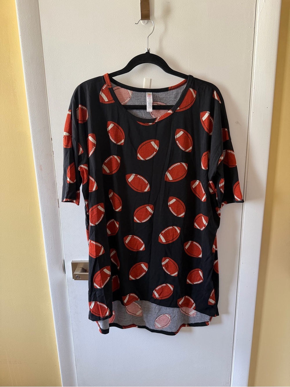 LuLaRoe Black Irma Tunic with Football Print